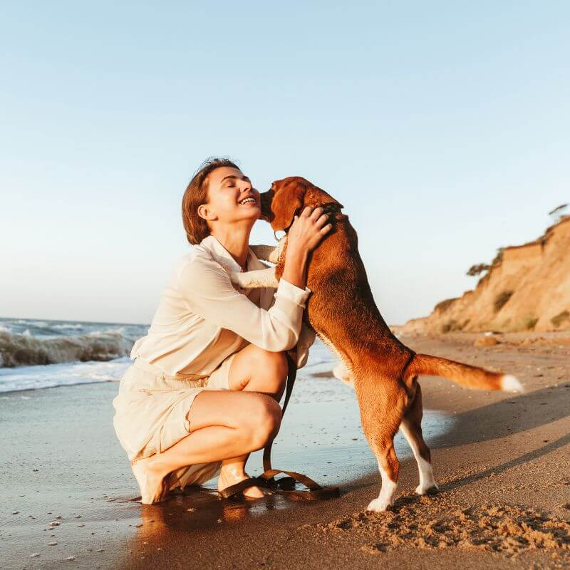 A woman and her dog enjoying a peaceful moment